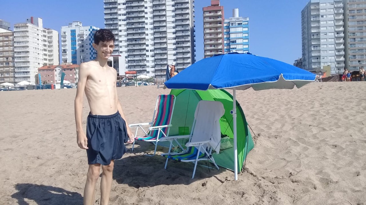 Pale and skinny on the beach