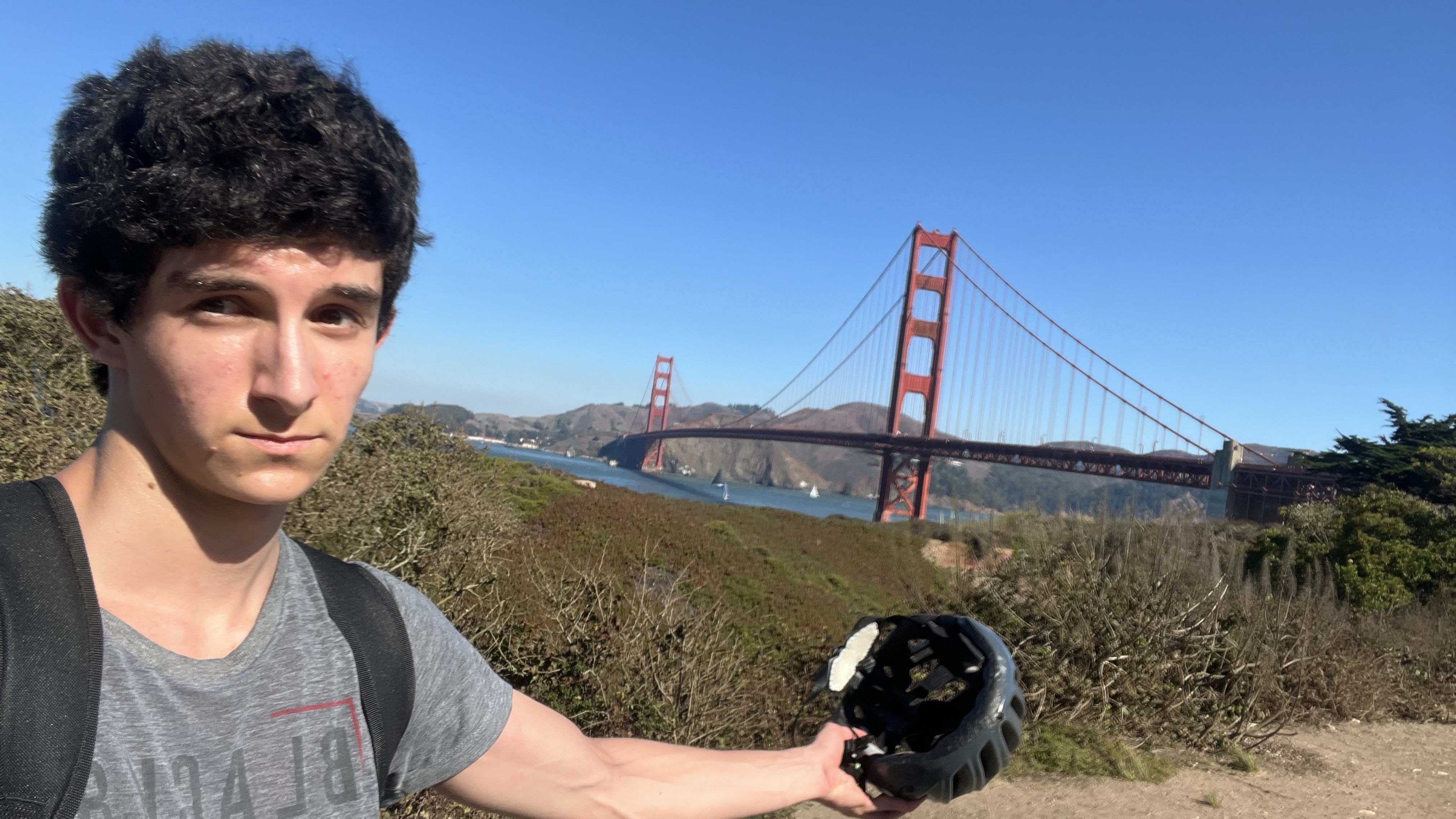 At the Golden Gate with a bike helmet